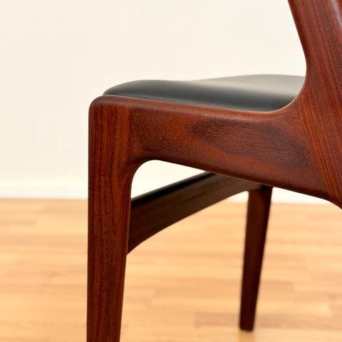 Danish dining chairs in walnut by Kai Kristiansen