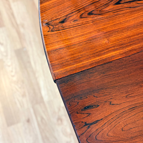 Danish round dining table in Santos rosewood