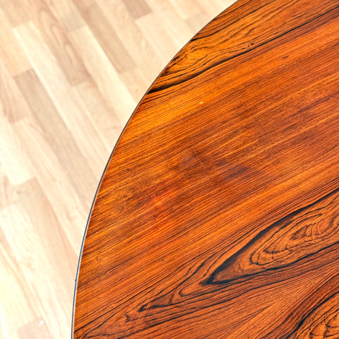 Danish round dining table in Santos rosewood