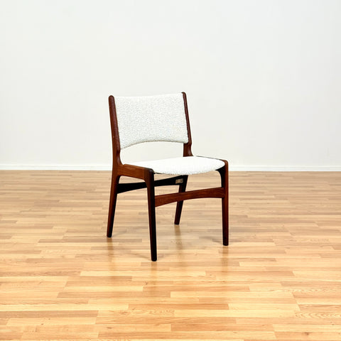 Danish dining chairs in solid walnut by Erik Buch