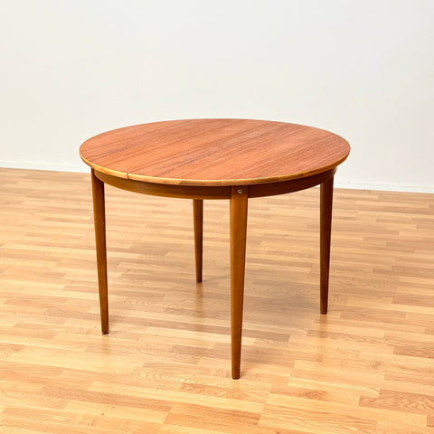 Swedish round dining table in teak