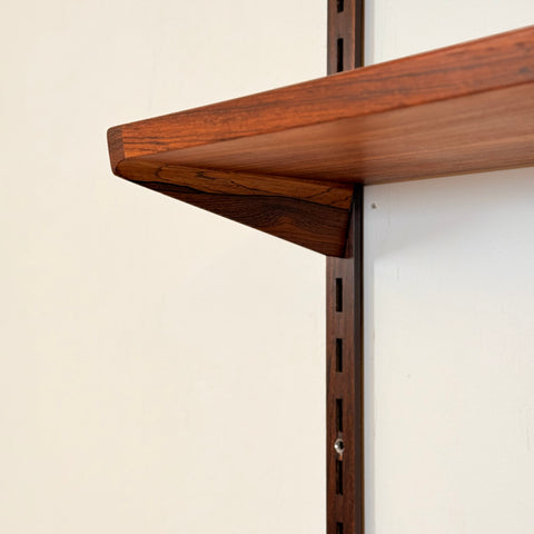 Danish wall unit / shelving system in Santos rosewood by Kai Kristiansen, for FM Mobler