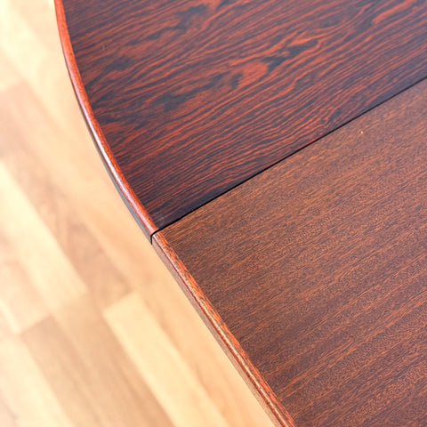 Danish round dining table in Santos rosewood by Oman Junn