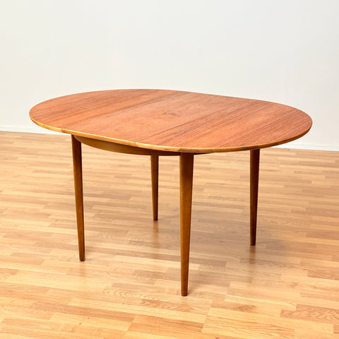 Swedish round dining table in teak