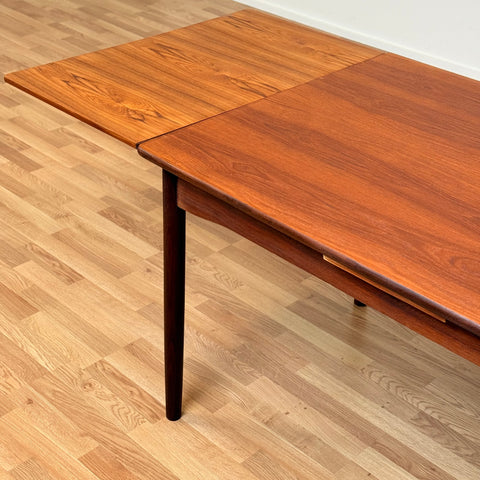 Danish dining table with in teak