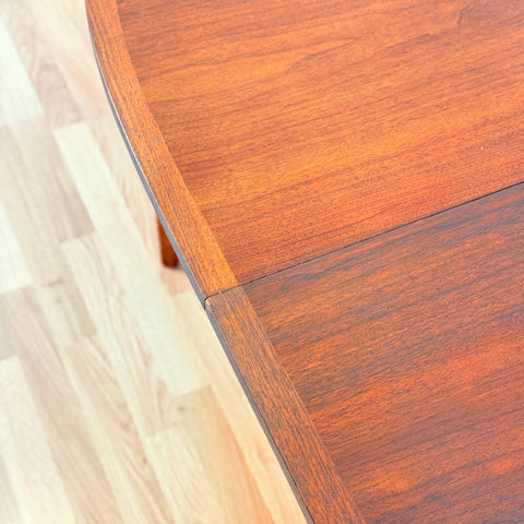 Swedish oval dining table in walnut by Albin Johansson & Söner