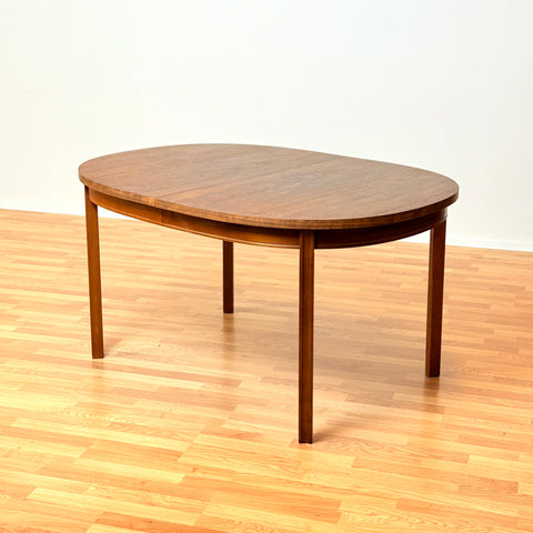Swedish oval dining table in walnut by Bertil Fridhagen