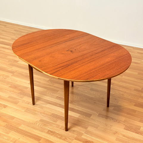 Swedish round dining table in teak