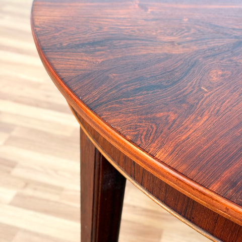 Danish round dining table in Santos rosewood
