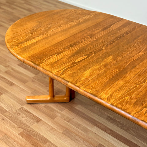 Danish round dining table in elm