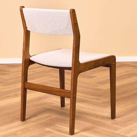 Danish dining chairs in walnut by Farstrup