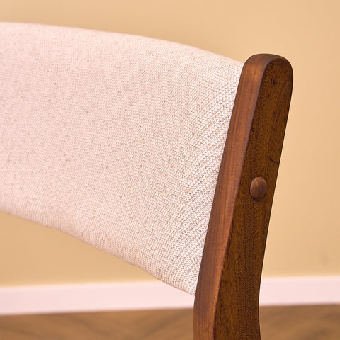 Danish dining chairs in walnut by Farstrup