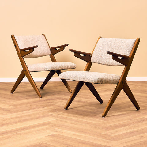 A set of 2 Danish armchair in oak and teak by Arne-Hovmand Olsen