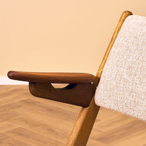 A set of 2 Danish armchair in oak and teak by Arne-Hovmand Olsen