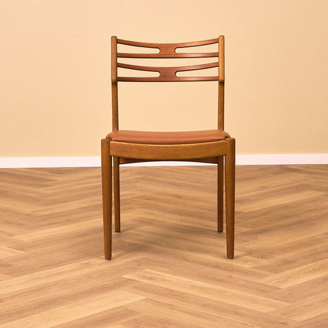 Danish dining chairs in teak and oak by Johannes Andersen for UIdum Møbelfabrik