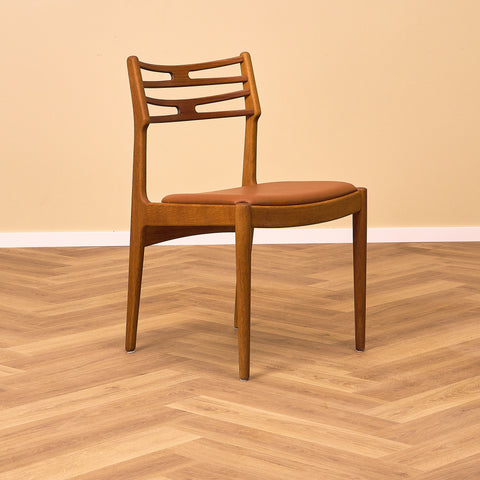 Danish dining chairs in teak and oak by Johannes Andersen for UIdum Møbelfabrik