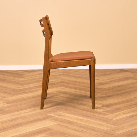 Danish dining chairs in teak and oak by Johannes Andersen for UIdum Møbelfabrik