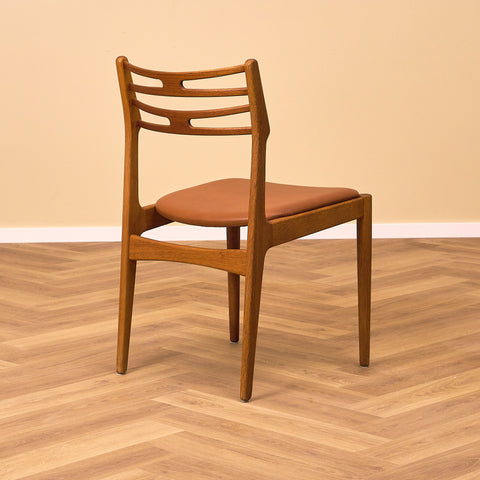 Danish dining chairs in teak and oak by Johannes Andersen for UIdum Møbelfabrik