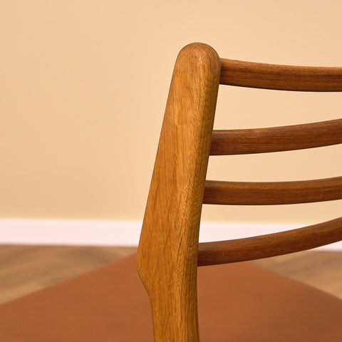 Danish dining chairs in teak and oak by Johannes Andersen for UIdum Møbelfabrik