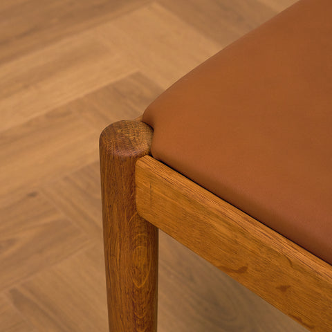Danish dining chairs in teak and oak by Johannes Andersen for UIdum Møbelfabrik