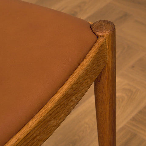 Danish dining chairs in teak and oak by Johannes Andersen for UIdum Møbelfabrik