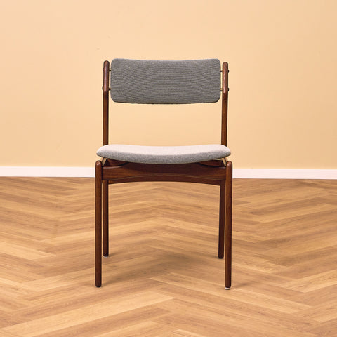Danish dining chairs in solid walnut by Erik Buch