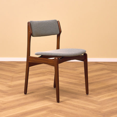 Danish dining chairs in solid walnut by Erik Buch