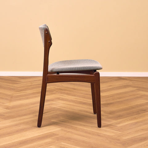 Danish dining chairs in solid walnut by Erik Buch