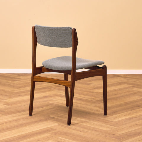 Danish dining chairs in solid walnut by Erik Buch