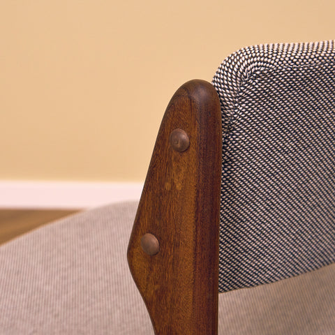 Danish dining chairs in solid walnut by Erik Buch