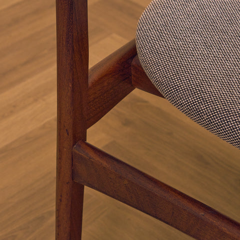 Danish dining chairs in solid walnut by Erik Buch