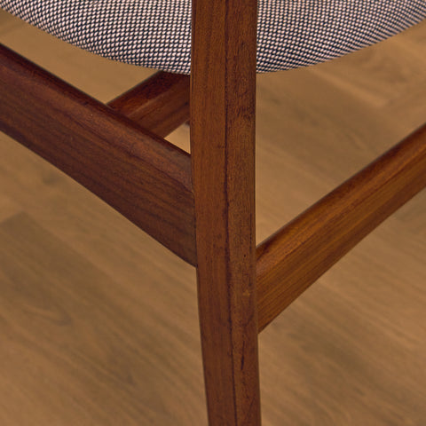 Danish dining chairs in solid walnut by Erik Buch
