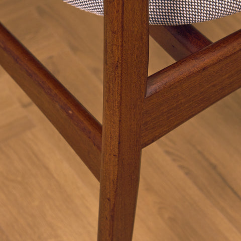 Danish dining chairs in solid walnut by Erik Buch