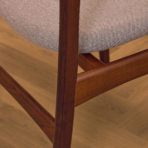 Danish dining chairs in solid walnut by Erik Buch