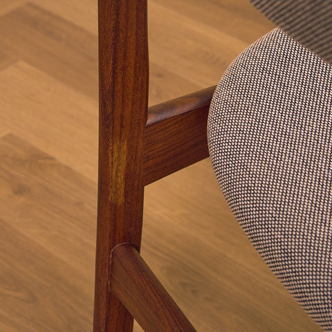 Danish dining chairs in solid walnut by Erik Buch