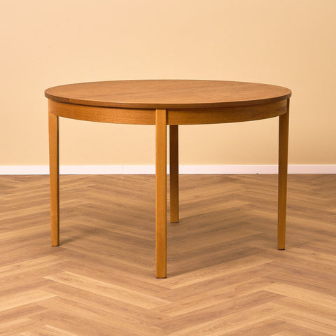 Swedish round dining table in teak by Nils Jonsson for Troeds