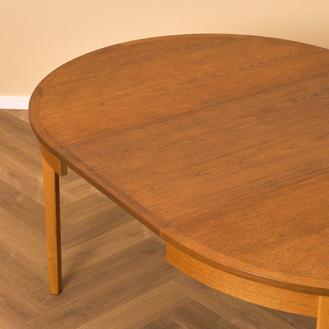 Swedish round dining table in teak by Nils Jonsson for Troeds