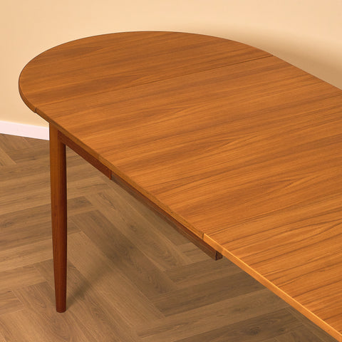 Danish dining table with 4 extensions in teak "Arne Vodder style"