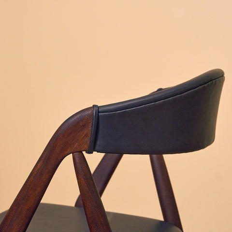 Danish dining chairs in walnut by Kai Kristiansen for Schou Andersen, model 31