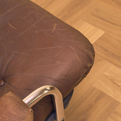 Mid-century armchair in leather and chrome