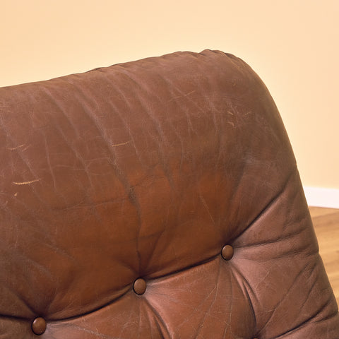 Mid-century armchair in leather and chrome