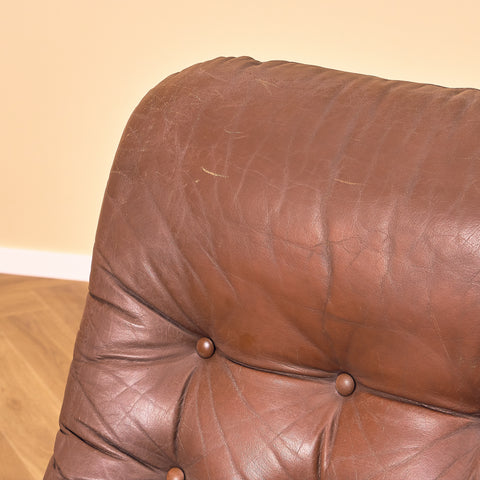 Mid-century armchair in leather and chrome