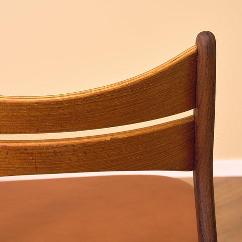 Danish dining chairs in solid walnut and teak by Erik Buch for Chr. Christensen Møbelfabrik, model 310