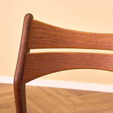 Danish dining chairs in solid walnut and teak by Erik Buch for Chr. Christensen Møbelfabrik, model 310