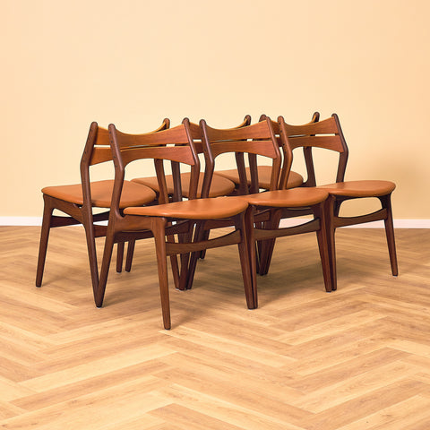 Danish dining chairs in solid walnut and teak by Erik Buch for Chr. Christensen Møbelfabrik, model 310