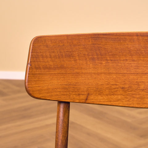 Dining chairs in teak & walnut by Farstrup