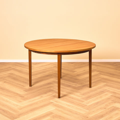 Swedish round dining table in teak