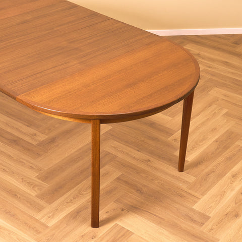 Swedish round dining table in walnut and teak by Ulferts