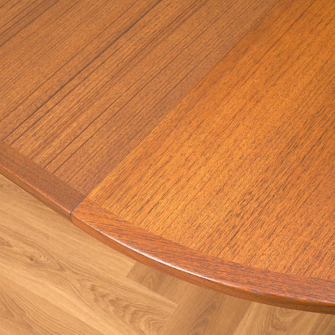 Swedish round dining table in walnut and teak by Ulferts
