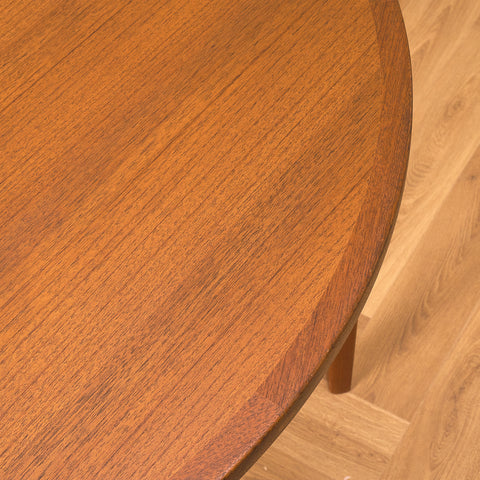 Swedish round dining table in walnut and teak by Ulferts